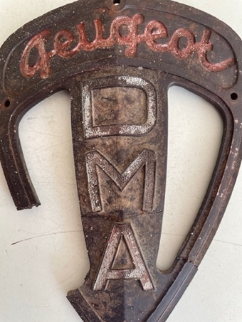 The broken Peugeot logo from the 1930s.